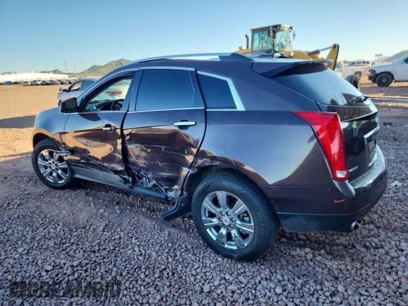 ✅ 2016 Cadillac SRX Luxury Collection • VIN: 3GYFNBE37GS512751 • Lot: 89899395. Wystawiony na Copart z przebiegiem 128 783 mil. Bezpłatny archiwum sprzedaży aukcyjnych z USA i szczegółowy raport historii pojazdu na DreamBid. Zdjęcie 2.