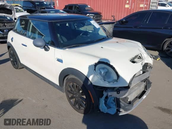 2017 MINI Hardtop Cooper S with VIN WMWXP7C57H3B93462, listed as a IAAI auction lot 43517920 with 56,050 mi miles and . Bid and sale history available at DreamBid. Image 1.