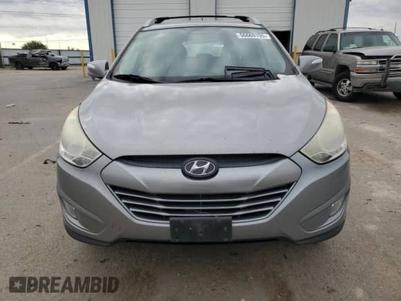 2013 Hyundai Tucson GLS z VIN KM8JU3AC6DU653140, wystawiony jako Copart lot #56669105 z przebiegiem 162 901 mil mil oraz Szkoda całkowita • Salvage title. Historia ofert i sprzedaży dostępna na DreamBid. Obrazek 5.