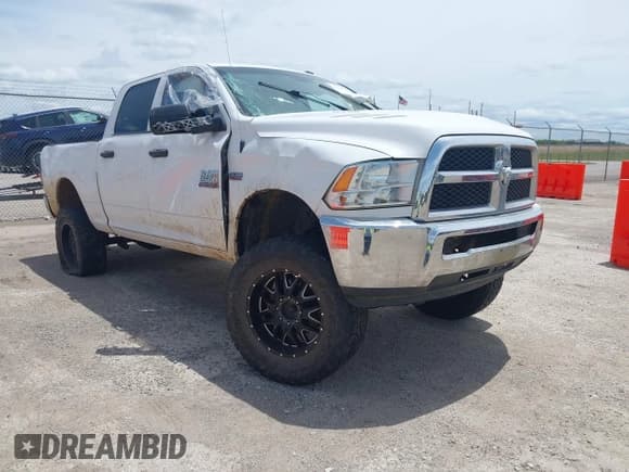 ✅ 2013 Ram 2500 Tradesman • VIN: 3C6TR5CT2DG526239 • Lot: 42150592. Listed on IAAI with 167,405 mi. Free auction sales archive from the USA and detailed vehicle history report at DreamBid. Image 1.