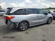 ✅ 2021 Honda Odyssey Touring • VIN: 5FNRL6H85MB039444 • Lot: 57142205. Listed on Copart with 74,228 mi. Free auction sales archive from the USA and detailed vehicle history report at DreamBid. Image 3.