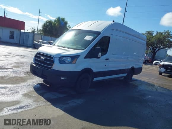 ✅ 2020 Ford Transit Cargo • VIN: 1FTBW3X84LKA65902 • Lot: 42931612. Listed on IAAI with 118,656 mi. Free auction sales archive from the USA and detailed vehicle history report at DreamBid. Image 2.