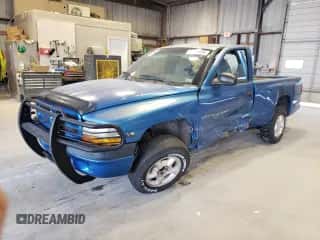 1999 Dodge Dakota SLT z VIN 1B7FL26X0XS298131, wystawiony jako Copart lot #69590254 z przebiegiem 162 606 mil mil oraz Szkoda całkowita • Salvage title. Historia ofert i sprzedaży dostępna na DreamBid. Obrazek 1.
