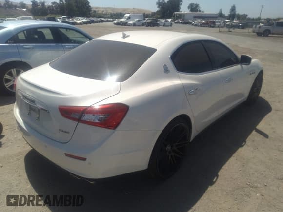 ✅ 2016 Maserati Ghibli • VIN: ZAM57XSAXG1172083 • Lot: 36744988. Listed on IAAI with 37,570 mi. Free auction sales archive from the USA and detailed vehicle history report at DreamBid. Image 4.