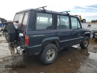 ✅ 1991 Isuzu Trooper • VIN: JACCH58E3M7900325 • Lot: 79525294. Listed on Copart with 146,593 mi. Free auction sales archive from the USA and detailed vehicle history report at DreamBid. Image 3.