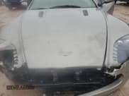 ✅ 2006 Aston Martin Vantage • VIN: SCFBB03BX6GC02042 • Лот: 42527075. Опубликован ранее на Copart с пробегом 61 538 миль. Бесплатный доступ к архиву аукционных продаж из США и подробный отчёт об истории автомобиля на DreamBid. Изображение 11.