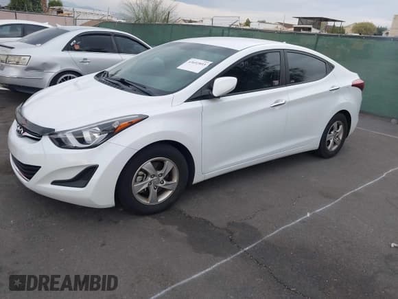 ✅ 2015 Hyundai Elantra SE • VIN: 5NPDH4AE4FH590128 • Lot: 43692893. Listed on IAAI with 81,836 mi. Free auction sales archive from the USA and detailed vehicle history report at DreamBid. Image 2.