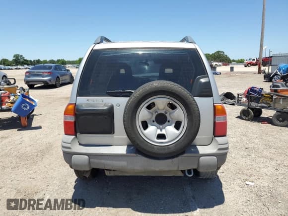 ✅ 2004 Suzuki Grand Vitara • VIN: 2S3TE62V446100708 • Lot: 57472595. Wystawiony na Copart z przebiegiem 195 151 mil. Bezpłatny archiwum sprzedaży aukcyjnych z USA i szczegółowy raport historii pojazdu na DreamBid. Zdjęcie 6.