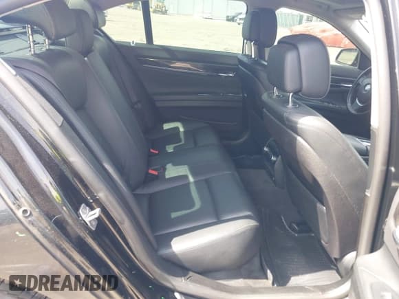 ✅ 2014 BMW 7 Series 740i • VIN: WBAYA6C55ED144778 • Лот: 42070256. Опубликован ранее на IAAI с пробегом 90 606 миль. Бесплатный доступ к архиву аукционных продаж из США и подробный отчёт об истории автомобиля на DreamBid. Изображение 8.