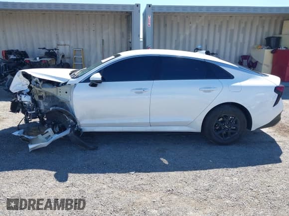 ✅ 2025 Kia K5 LXS • VIN: KNAG24J76S5275919 • Lot: 43343631. Listed on IAAI with 31,847 mi. Free auction sales archive from the USA and detailed vehicle history report at DreamBid. Image 15.