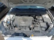 ✅ 2014 Mazda 3 S Touring • VIN: JM1BM1V36E1178325 • Лот: 42860222. Опубликован ранее на IAAI с пробегом 220 945 миль. Бесплатный доступ к архиву аукционных продаж из США и подробный отчёт об истории автомобиля на DreamBid. Изображение 10.