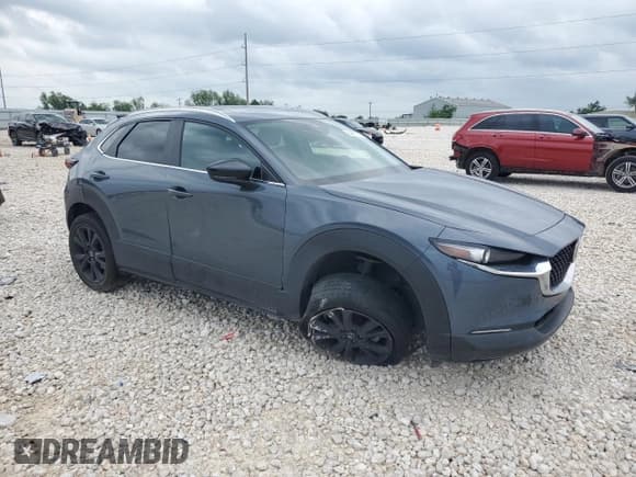 ✅ 2023 Mazda CX-30 S Carbon Edition • VIN: 3MVDMBCM2PM539130 • Лот: 54817735. Опубликован ранее на Copart с пробегом 29 678 миль. Бесплатный доступ к архиву аукционных продаж из США и подробный отчёт об истории автомобиля на DreamBid. Изображение 4.