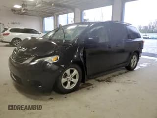 ✅ 2016 Toyota Sienna LE • VIN: 5TDKK3DC8GS727855 • Lot: 91358325. Listed on Copart with 128,836 mi. Free auction sales archive from the USA and detailed vehicle history report at DreamBid. Image 1.