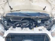 ✅ 2021 Ford Transit Cargo • VIN: 1FTYE1C83MKA79007 • Lot: 42823323. Wystawiony na IAAI z przebiegiem 124 898 mil. Bezpłatny archiwum sprzedaży aukcyjnych z USA i szczegółowy raport historii pojazdu na DreamBid. Zdjęcie 10.