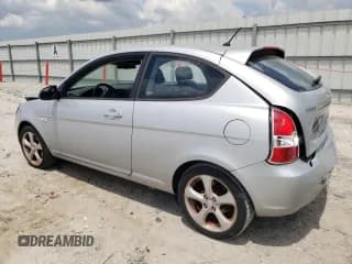 ✅ 2007 Hyundai Accent SE • VIN: KMHCN36C67U020057 • Лот: 61012645. Опубликован ранее на Copart с пробегом 155 714 миль. Бесплатный доступ к архиву аукционных продаж из США и подробный отчёт об истории автомобиля на DreamBid. Изображение 2.