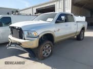 ✅ 2014 Ram 2500 Longhorn • VIN: 3C6UR5GLXEG244401 • Lot: 41779709. Listed on IAAI with 180,760 mi. Free auction sales archive from the USA and detailed vehicle history report at DreamBid. Image 2.