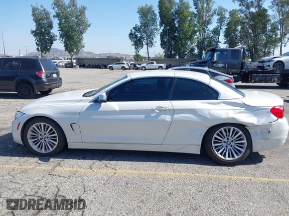 ✅ 2015 BMW 4 Series 428i • VIN: WBA3V7C51FP771904 • Лот: 42316801. Опубликован ранее на IAAI с пробегом 93 391 миль. Бесплатный доступ к архиву аукционных продаж из США и подробный отчёт об истории автомобиля на DreamBid. Изображение 14.