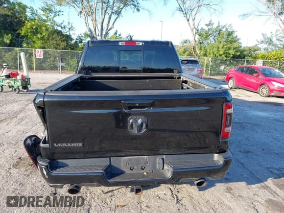 ✅ 2021 Ram 1500 Laramie • VIN: 1C6RREJT5MN544075 • Lot: 43603819. Listed on IAAI with 88,025 mi. Free auction sales archive from the USA and detailed vehicle history report at DreamBid. Image 16.
