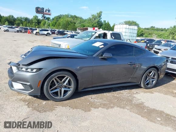 ✅ 2024 Ford Mustang EcoBoost • VIN: 1FA6P8TH2R5129871 • Lot: 42722564. Listed on IAAI with 5,157 mi. Free auction sales archive from the USA and detailed vehicle history report at DreamBid. Image 14.