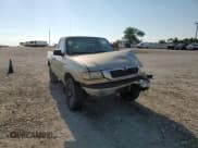 ✅ 2000 Mazda B-Series SX • VIN: 4F4YR12CXYTM07685 • Lot: 84548525. Wystawiony na Copart z przebiegiem 227 721 mil. Bezpłatny archiwum sprzedaży aukcyjnych z USA i szczegółowy raport historii pojazdu na DreamBid. Zdjęcie 14.