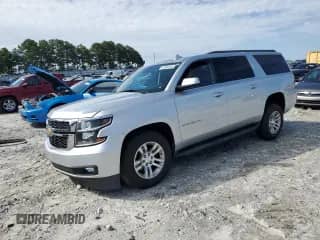 2020 Chevrolet Suburban LT z VIN 1GNSCHKC8LR288623, wystawiony jako Copart lot #65366405 z przebiegiem 108 527 mil mil oraz Szkoda całkowita • Salvage title. Historia ofert i sprzedaży dostępna na DreamBid. Obrazek 1.