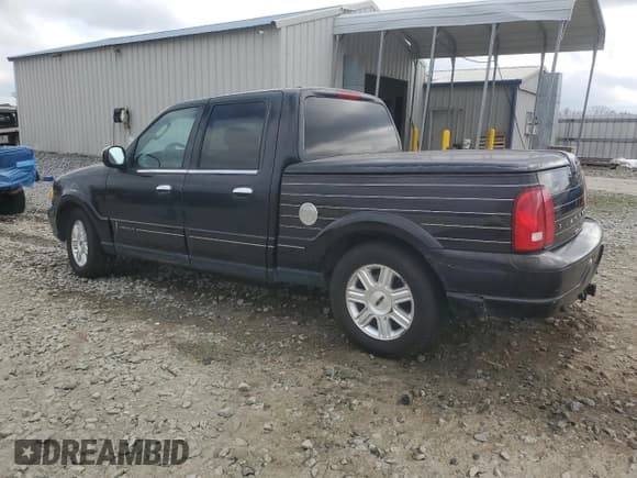 ✅ 2002 Lincoln Blackwood • VIN: 5LTEW05A72KJ01109 • Lot: 44192655. Listed on Copart with Not provided. Free auction sales archive from the USA and detailed vehicle history report at DreamBid. Image 2.