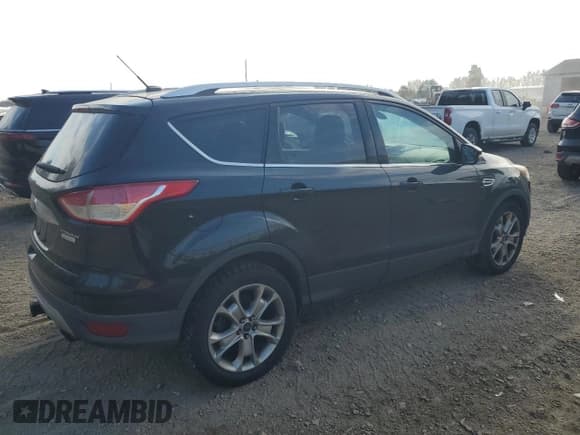 ✅ 2014 Ford Escape Titanium • VIN: 1FMCU0J96EUD19302 • Lot: 86528005. Listed on Copart with 198,303 mi. Free auction sales archive from the USA and detailed vehicle history report at DreamBid. Image 3.
