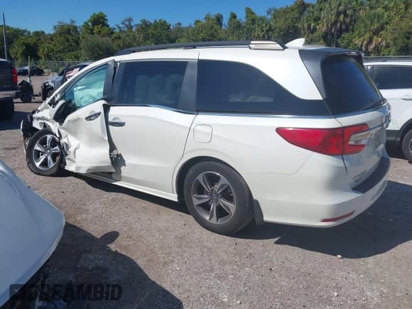 ✅ 2018 Honda Odyssey Touring • VIN: 5FNRL6H84JB027099 • Лот: 43503552. Опубликован ранее на IAAI с пробегом 108 710 миль. Бесплатный доступ к архиву аукционных продаж из США и подробный отчёт об истории автомобиля на DreamBid. Изображение 3.