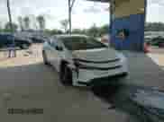 2025 Toyota Prius LE с VIN JTDACAAU5S3052468, выставлен на аукционе Copart как лот 81701345 с пробегом Не указан миль и Списание • Salvage title. История ставок и продаж доступна на DreamBid. Изображение 13.