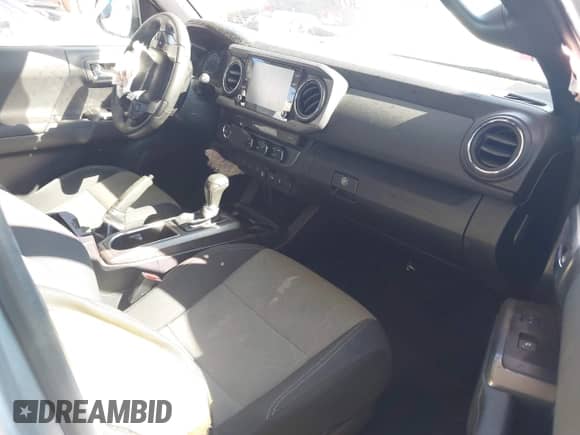 2022 Toyota Tacoma SR5 with VIN 3TMAZ5CN9NM186656, listed as a IAAI auction lot 43253480 with 25,540 mi miles and . Bid and sale history available at DreamBid. Image 5.