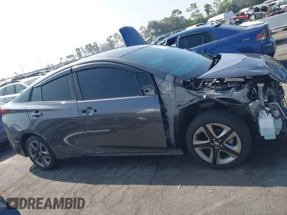 2022 Toyota Prius L Eco z VIN JTDKAMFU8N3173343, wystawiony jako IAAI lot #43008600 z przebiegiem 46 161 mil mil oraz . Historia ofert i sprzedaży dostępna na DreamBid. Obrazek 14.