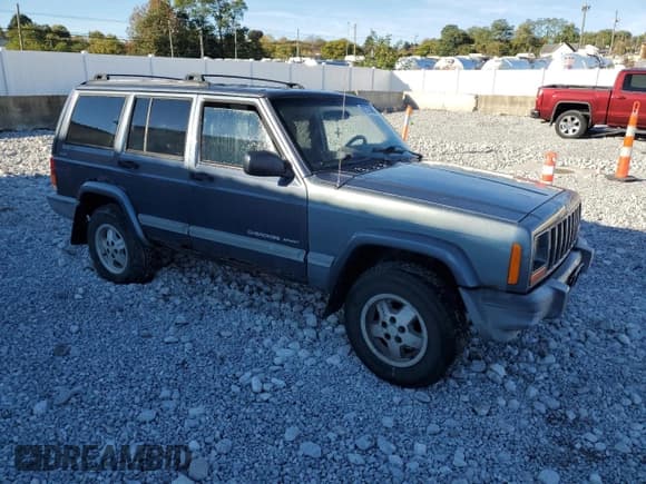 ✅ 2001 Jeep Cherokee Sport • VIN: 1J4FF48S21L567522 • Lot: 87275805. Listed on Copart with 278,075 mi. Free auction sales archive from the USA and detailed vehicle history report at DreamBid. Image 4.