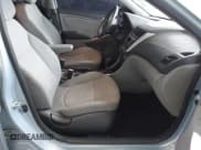 ✅ 2014 Hyundai Accent GS • VIN: KMHCT5AE5EU183872 • Lot: 43828884. Listed on IAAI with 121,613 mi. Free auction sales archive from the USA and detailed vehicle history report at DreamBid. Image 5.