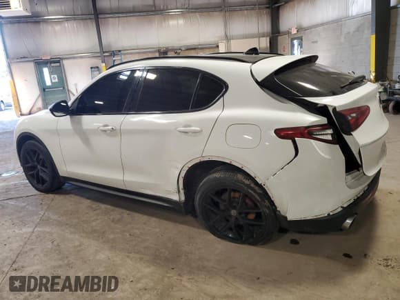 ✅ 2018 Alfa Romeo Stelvio Ti Lusso • VIN: ZASFAKRN9J7C28581 • Lot: 87161574. Listed on Copart with 71,431 mi. Free auction sales archive from the USA and detailed vehicle history report at DreamBid. Image 2.