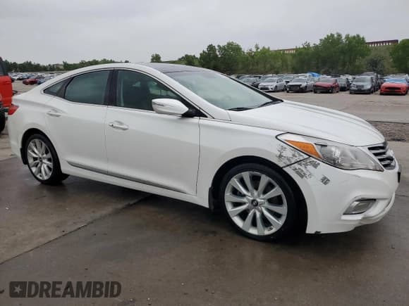 ✅ 2013 Hyundai Azera • VIN: KMHFH4JG6DA206540 • Лот: 59350095. Опубликован ранее на Copart с пробегом 65 579 миль. Бесплатный доступ к архиву аукционных продаж из США и подробный отчёт об истории автомобиля на DreamBid. Изображение 4.
