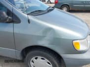 ✅ 2000 Toyota Sienna CE • VIN: 4T3ZF19C0YU210825 • Lot: 42700730. Listed on IAAI with 169,766 mi. Free auction sales archive from the USA and detailed vehicle history report at DreamBid. Image 6.