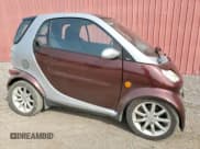✅ 2006 Smart fortwo • VIN: WMEAJ00F56J262624 • Лот: 67174405. Опубликован ранее на Copart с пробегом 125 366 миль. Бесплатный доступ к архиву аукционных продаж из США и подробный отчёт об истории автомобиля на DreamBid. Изображение 4.