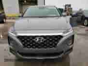 2020 Hyundai Santa Fe SE z VIN 5NMS23AD0LH156470, wystawiony jako Copart lot #38749673 z przebiegiem 62 186 mil mil oraz . Historia ofert i sprzedaży dostępna na DreamBid. Obrazek 5.
