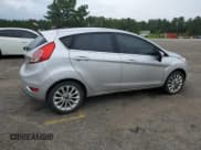 ✅ 2017 Ford Fiesta Titanium • VIN: 3FADP4FJ3HM136481 • Lot: 59622785. Listed on Copart with 130,658 mi. Free auction sales archive from the USA and detailed vehicle history report at DreamBid. Image 3.