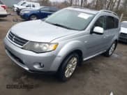 ✅ 2009 Mitsubishi Outlander SE • VIN: JA4MT31W89Z003101 • Lot: 41487678. Listed on IAAI with 90,226 mi. Free auction sales archive from the USA and detailed vehicle history report at DreamBid. Image 2.