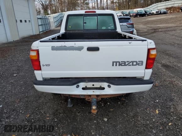 ✅ 2003 Mazda B-Series DS • VIN: 4F4YR16U03TM06847 • Lot: 89513975. Wystawiony na Copart z przebiegiem 95 629 mil. Bezpłatny archiwum sprzedaży aukcyjnych z USA i szczegółowy raport historii pojazdu na DreamBid. Zdjęcie 6.