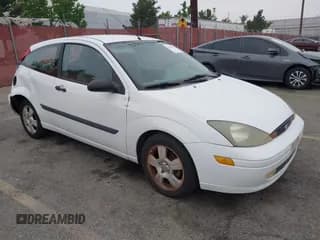 ✅ 2003 Ford Focus ZX3 • VIN: 3FAFP31Z23R147547 • Lot: 42426117. Listed on IAAI with 129,860 mi. Free auction sales archive from the USA and detailed vehicle history report at DreamBid. Image 1.