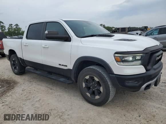 2020 Ram 1500 Rebel z VIN 1C6RRELT2LN303523, wystawiony jako Copart lot #54753485 z przebiegiem 90 533 mil mil oraz Szkoda całkowita • Salvage title. Historia ofert i sprzedaży dostępna na DreamBid. Obrazek 4.