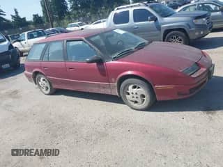 1994 Saturn SW z VIN 1G8ZJ8575RZ205082, wystawiony jako IAAI lot #42802187 z przebiegiem 279 694 mil mil oraz . Historia ofert i sprzedaży dostępna na DreamBid. Obrazek 1.