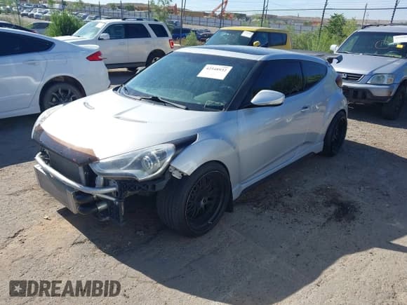 ✅ 2013 Hyundai Veloster Turbo • VIN: KMHTC6AE1DU157273 • Lot: 42548932. Wystawiony na IAAI z przebiegiem 138 982 mil. Bezpłatny archiwum sprzedaży aukcyjnych z USA i szczegółowy raport historii pojazdu na DreamBid. Zdjęcie 2.