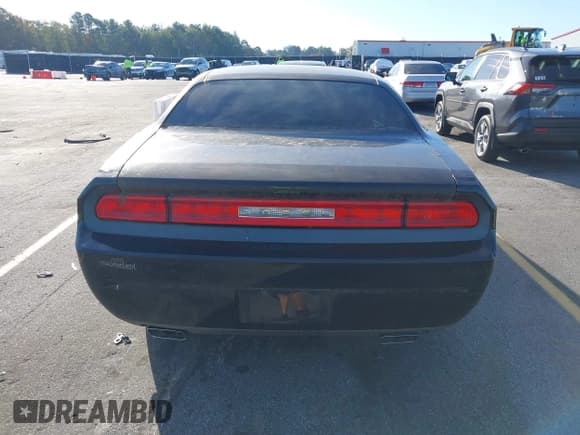 ✅ 2014 Dodge Challenger SXT • VIN: 2C3CDYAG7EH304459 • Lot: 43682366. Listed on IAAI with 197,016 mi. Free auction sales archive from the USA and detailed vehicle history report at DreamBid. Image 16.