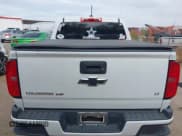 ✅ 2020 Chevrolet Colorado 2WD LT • VIN: 1GCGSCEN0L1124654 • Lot: 42248002. Listed on IAAI with 76,223 mi. Free auction sales archive from the USA and detailed vehicle history report at DreamBid. Image 16.