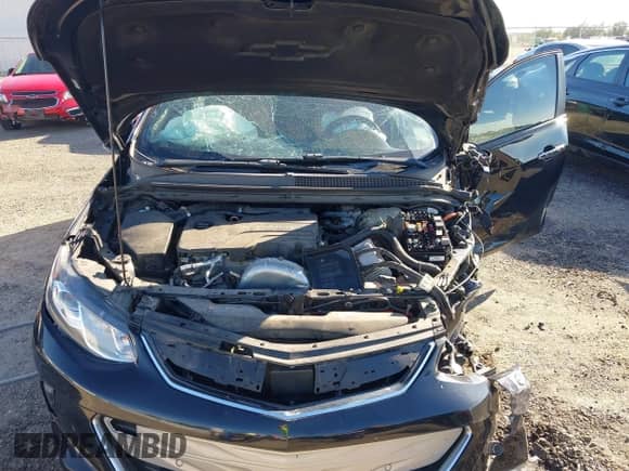 2017 Chevrolet Volt Premier z VIN 1G1RB6S5XHU203648, wystawiony jako IAAI lot #43468353 z przebiegiem Nie podano mil oraz . Historia ofert i sprzedaży dostępna na DreamBid. Obrazek 10.