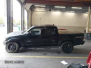 ✅ 2014 Toyota Tacoma • VIN: 3TMLU4ENXEM143779 • Lot: 43475792. Listed on IAAI with 156,975 mi. Free auction sales archive from the USA and detailed vehicle history report at DreamBid. Image 14.