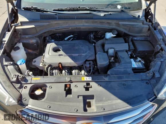 ✅ 2017 Hyundai Santa Fe 2.4L • VIN: 5NMZTDLB6HH004648 • Lot: 82200395. Wystawiony na Copart z przebiegiem 97 307 mil. Bezpłatny archiwum sprzedaży aukcyjnych z USA i szczegółowy raport historii pojazdu na DreamBid. Zdjęcie 12.